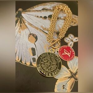 Louis Vuitton Red and Gold Pendant